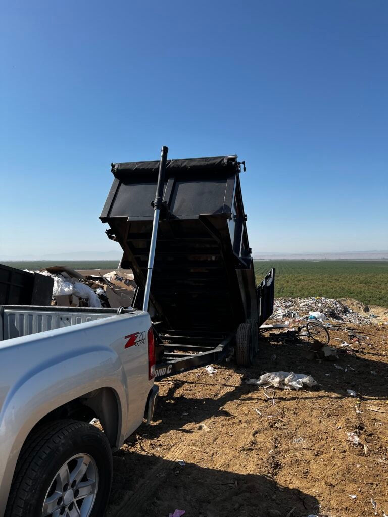 Our team at Precision Junk Disposal, dumping trash at landfill in Bakersfield California